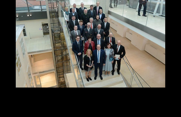 AUSTRIA : A number of Customs officers were presented with Certificates of Merit by the State Secretary, Ministry of Finance, Herbert Fuchs (front row, 2nd from l.), and the Austrian Customs Attaché, Brussels, Anton Zeilinger (back row, far r.). Also present were the Director of Austrian Customs, Bettina Vogl-Lang (front row, 2nd from the r.), the DG for Economic Policy, Financial Markets and Customs, Harald Waiglein (not pictured), and the DG for Corporate Management and Services, Eduard Müller (5th row, far r.). 