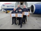 UK Border Force officers posing with boxes containing the iguanas at Heathrow before boarding a flight to Nassau. As the species is so incredibly rare, special dispensation was given to carry them in the main cabin of the aircraft. Photo credit Steve Parsons/PA